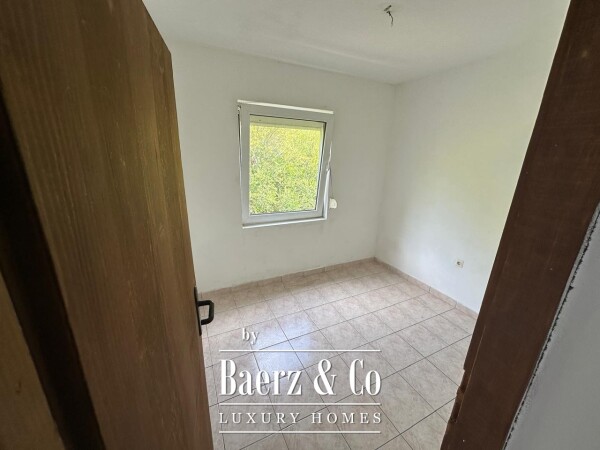 photo 12 House with a Plot in a Premium Location for Renovation